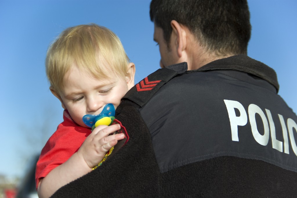 Police-with-child-1024x685