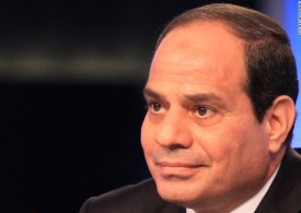 Egypt's ex-army chief and leading presidential candidate Abdel Fattah al-Sisi gives his first television interview since announcing his candidacy in Cairo on May 4, 2014. Sisi is expected to win the May 26-27 election easily riding on a wave of popularity after he ousted in July Mohamed Morsi, Egypt's first freely elected president. The 59-year-old retired field marshal, dressed in a suit and appearing composed and often smiling in what was a pre-recorded interview, is seen by supporters as a strong leader who can restore stability, but his opponents fear that might come at the cost of freedoms sought in the pro-democracy uprising three years ago. AFP PHOTO/STR        (Photo credit should read STR/AFP/Getty Images)